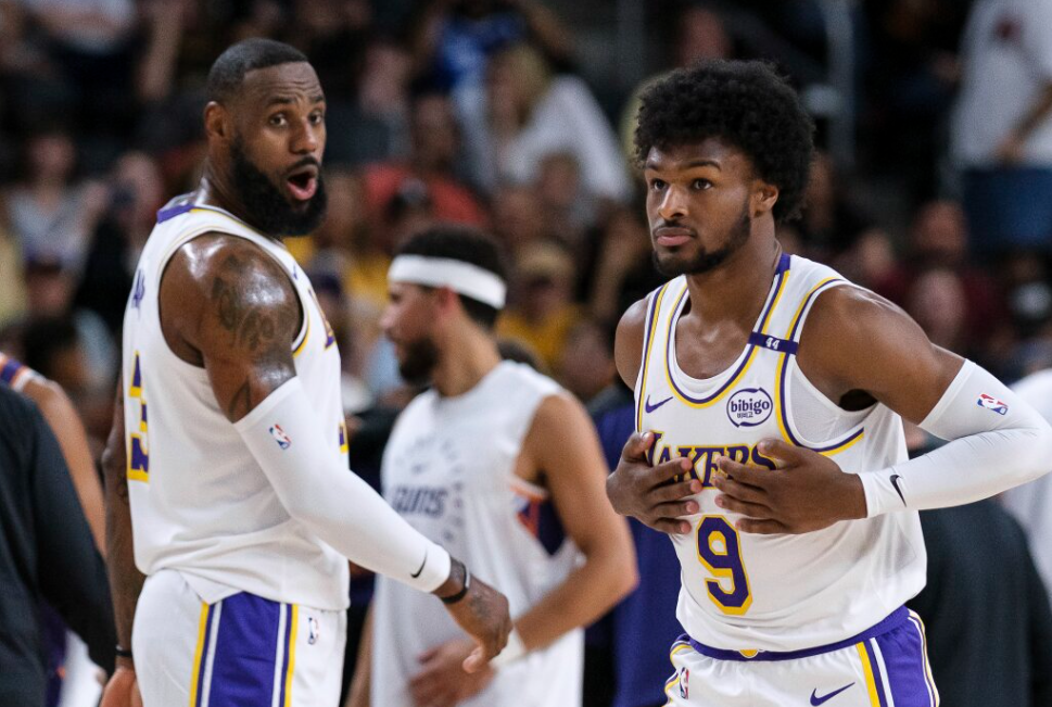 Bronny James (right) and Lebron James (left) playing together for the Lakers. Photo provided by NPR