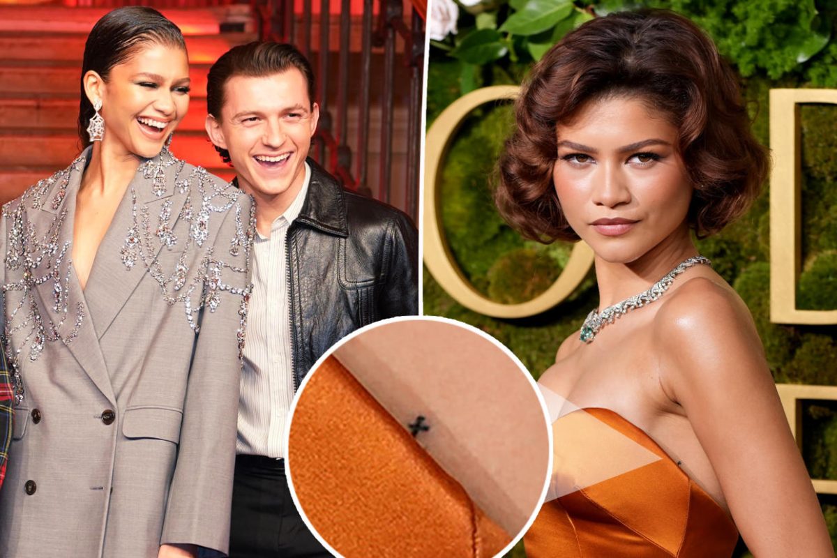 Zendaya's engagement ring at the Golden Globes on January 3, 2025. Photo provided by BuzzFeed.

Zendaya's new tattoo that looks like a "t" above the ribs, seen at the Golden Globes on January 3, 2025. Photo provided by Yahoo.