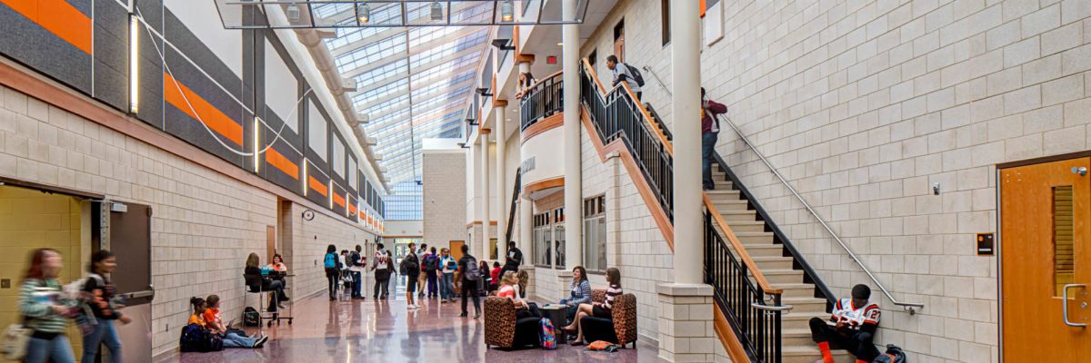 Belleville High School Athletic Hallway during the school day, students socializing in between classes. August 2013.