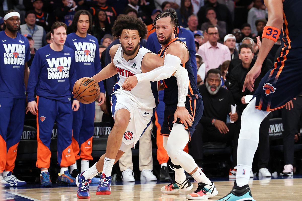 Cade Cunningham driving in with the ball against Jaylen Brunson and the Knicks during the 3rd playoff game.