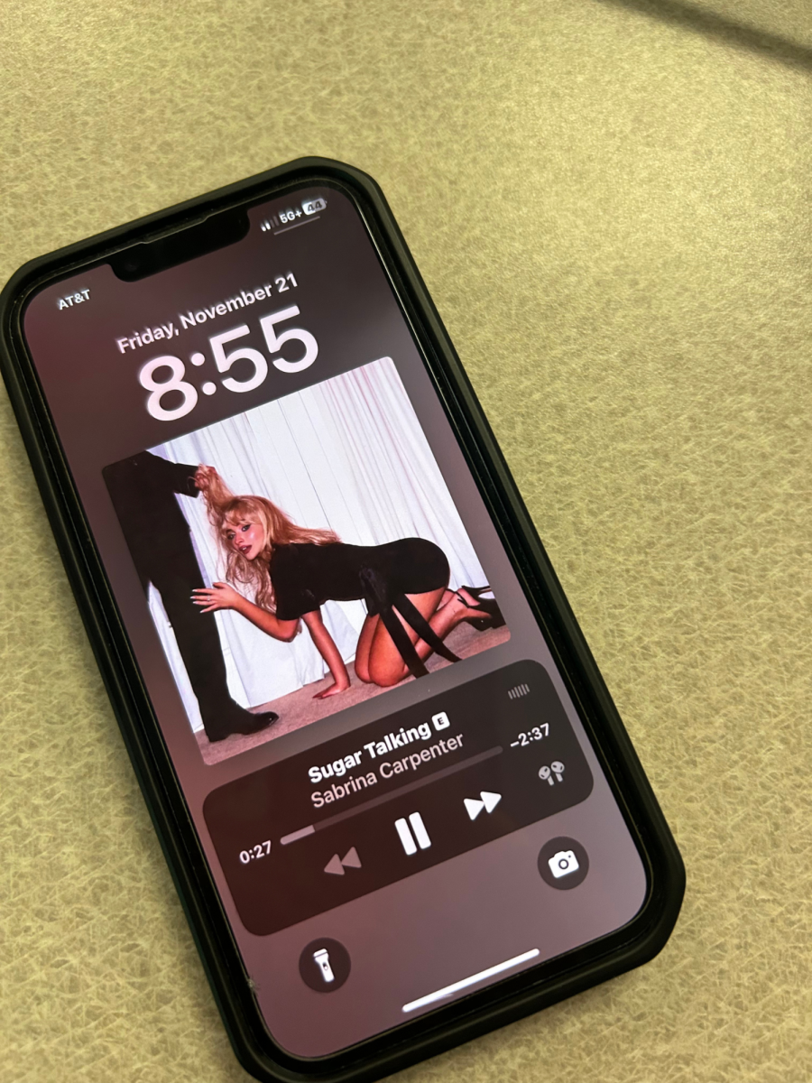 "Sugar Talking" by Sabrina Carpenter playing on Spotify.