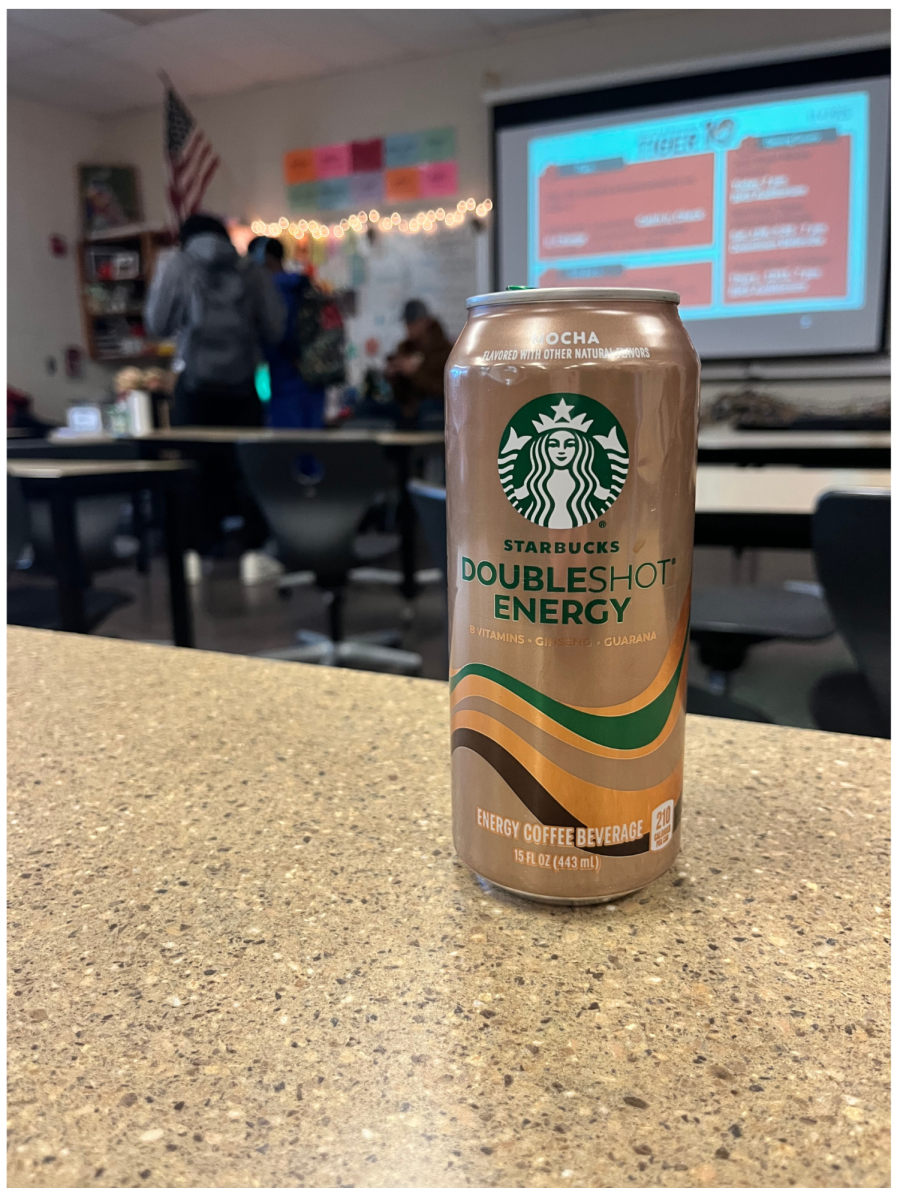 A student's Starbucks DoubleShot Energy on a table in a classroom. 