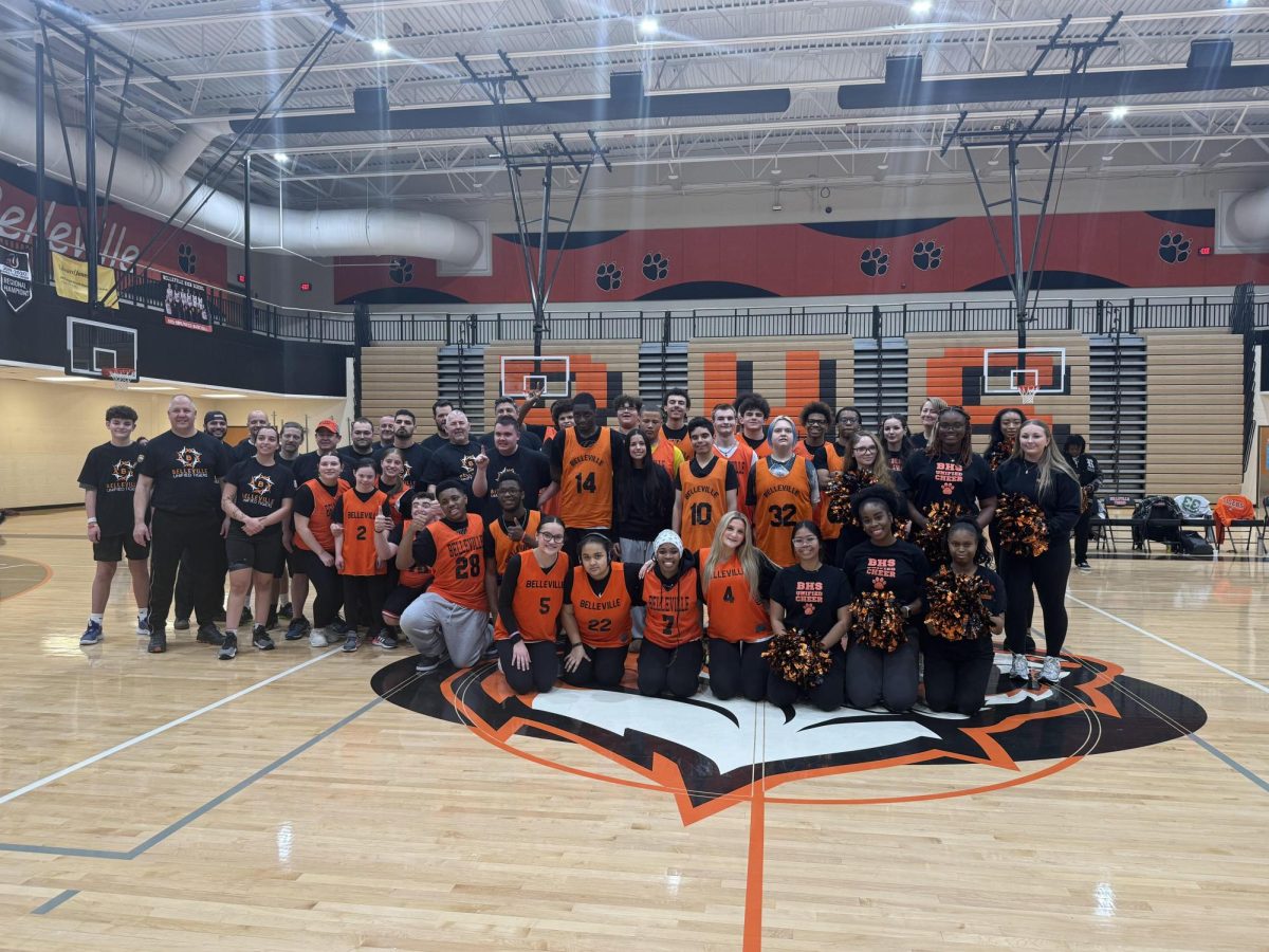 Belleville Unified Tigers Defeat First Responders 74-24 at Belleville High School.