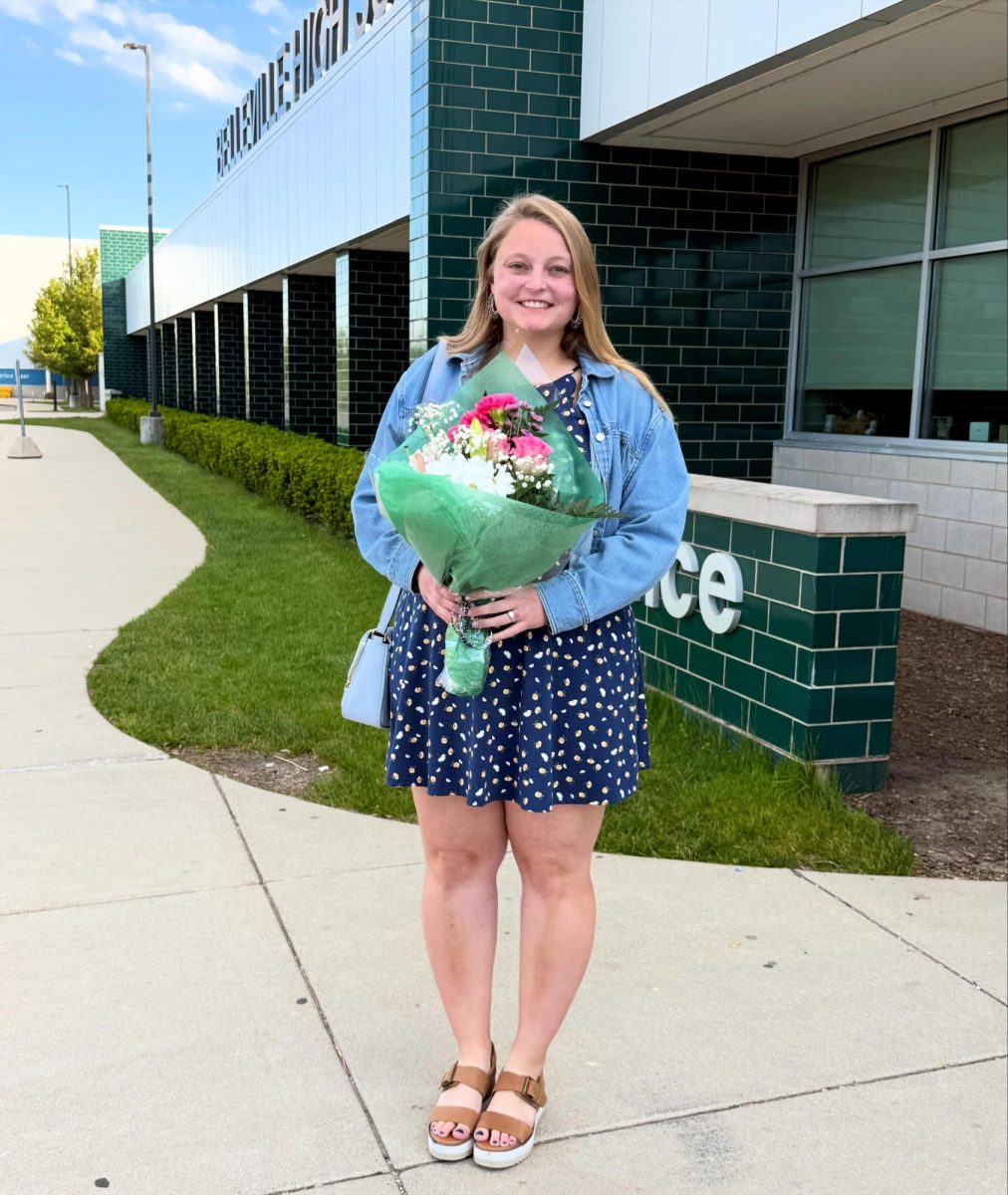 Paige Fordice, recipient of Kiwanis Teacher of the Year, stands outside Belleville High School after getting her award.